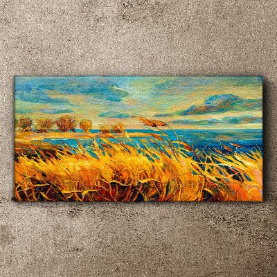 Foto auf leinwand Goldenes Gras über blauem Wasser