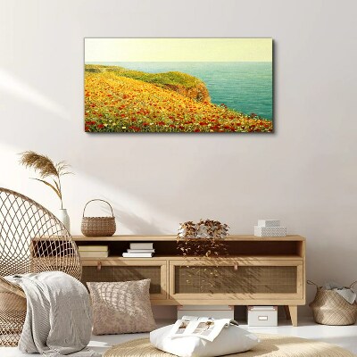 Foto auf leinwand Blumenhügel am Meer