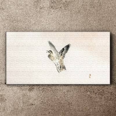 Foto auf leinwand Vogelflug in zarten Farben