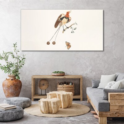 Foto auf leinwand Ein Vogel auf einem Ast mit Früchten