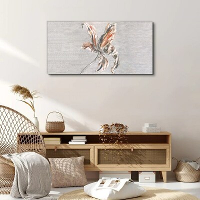 Foto auf leinwand Eine zarte Blume auf grauem Hintergrund
