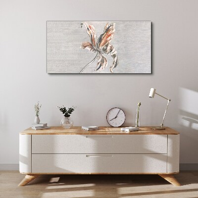 Foto auf leinwand Eine zarte Blume auf grauem Hintergrund