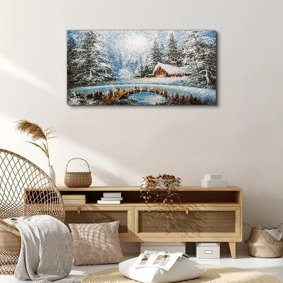 Foto auf leinwand Winterlandschaft mit einer Hütte im Wald