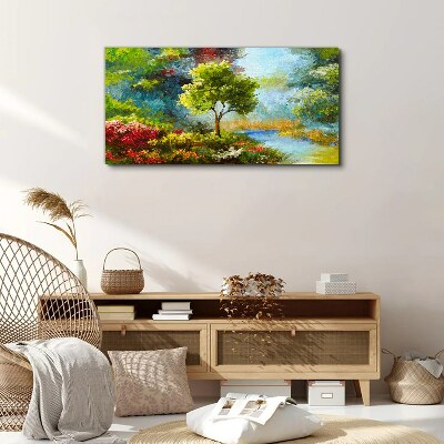 Foto leinwand Frühlingslandschaft mit einem Baum und Blumen