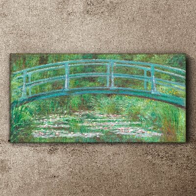 Bild auf leinwand Eine Brücke über den Teich