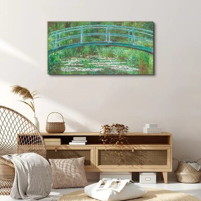 Bild auf leinwand Eine Brücke über den Teich