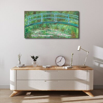 Bild auf leinwand Eine Brücke über den Teich