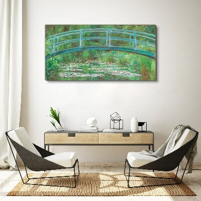 Bild auf leinwand Eine Brücke über den Teich