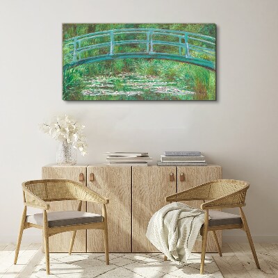 Bild auf leinwand Eine Brücke über den Teich