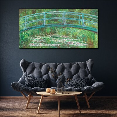 Bild auf leinwand Eine Brücke über den Teich