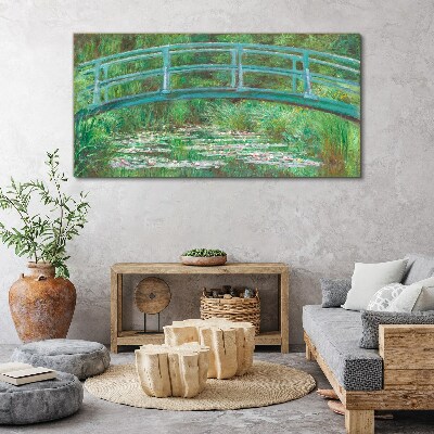 Bild auf leinwand Eine Brücke über den Teich