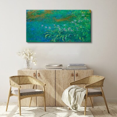 Foto auf leinwand Grüne Landschaft mit Blumen