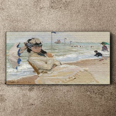 Foto auf leinwand Frau am Strand mit einem Sonnenschirm
