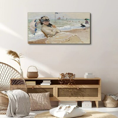 Foto auf leinwand Frau am Strand mit einem Sonnenschirm