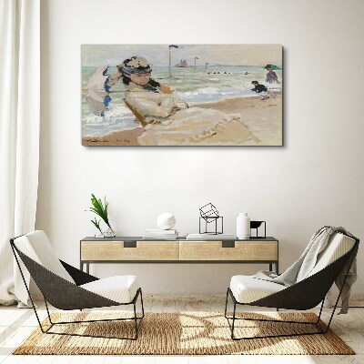 Foto auf leinwand Frau am Strand mit einem Sonnenschirm