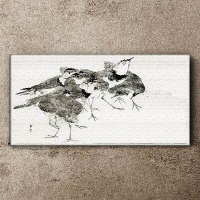 Foto auf leinwand Ein Vogelschwarm vor weißem Hintergrund