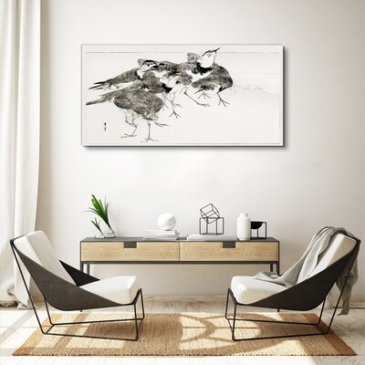 Foto auf leinwand Ein Vogelschwarm vor weißem Hintergrund