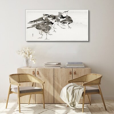 Foto auf leinwand Ein Vogelschwarm vor weißem Hintergrund