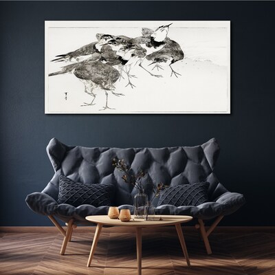 Foto auf leinwand Ein Vogelschwarm vor weißem Hintergrund