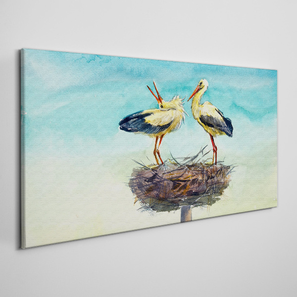 Foto auf leinwand Störche auf einem Nest im Blau