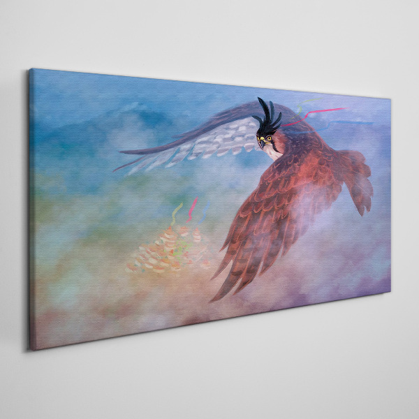 Foto auf leinwand Flug eines Raubvogels in den Wolken