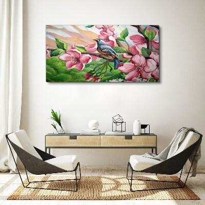 Foto auf leinwand Ein Vogel vor einem Hintergrund aus Frühlingsblumen