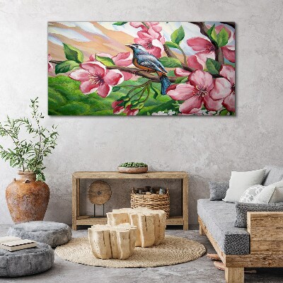 Foto auf leinwand Ein Vogel vor einem Hintergrund aus Frühlingsblumen