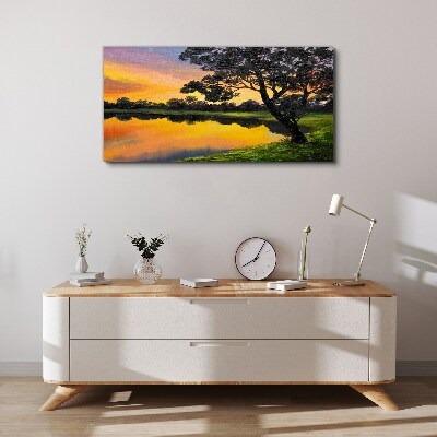 Wandbild Sonnenuntergang über dem See