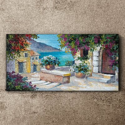 Bild auf leinwand Eine Küstenstadt voller Blumen
