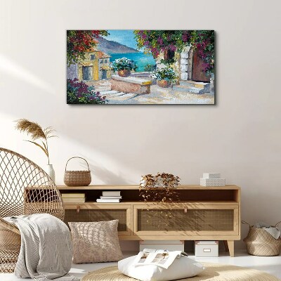 Bild auf leinwand Eine Küstenstadt voller Blumen