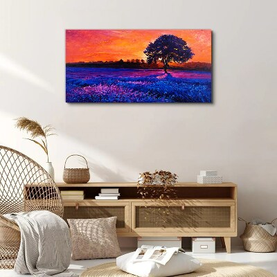 Foto auf leinwand Sonnenuntergang über einem lila Feld