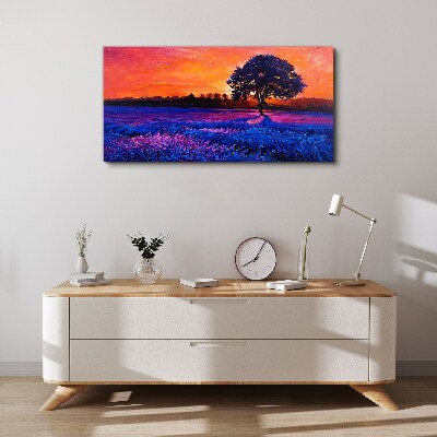 Foto auf leinwand Sonnenuntergang über einem lila Feld