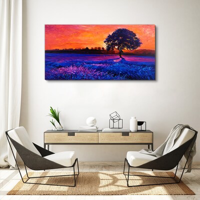 Foto auf leinwand Sonnenuntergang über einem lila Feld