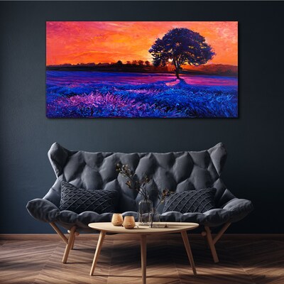Foto auf leinwand Sonnenuntergang über einem lila Feld