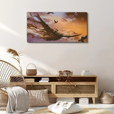 Foto auf leinwand Vogelflug in der untergehenden Sonne
