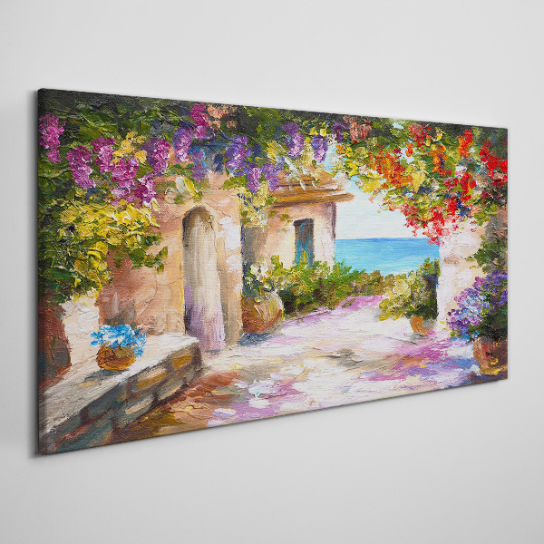 Foto auf leinwand Die Blumenallee eines Küstendorfes
