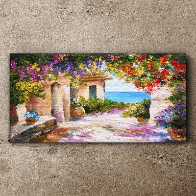 Foto auf leinwand Die Blumenallee eines Küstendorfes