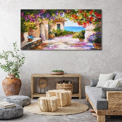 Foto auf leinwand Die Blumenallee eines Küstendorfes