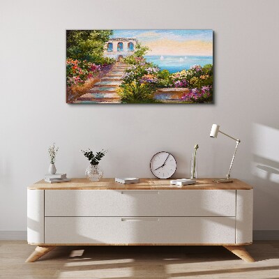 Foto auf leinwand Ein Spaziergang zwischen Blumen am Meer