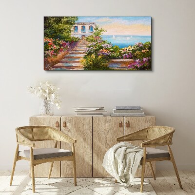 Foto auf leinwand Ein Spaziergang zwischen Blumen am Meer