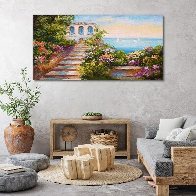 Foto auf leinwand Ein Spaziergang zwischen Blumen am Meer