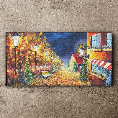 Foto auf leinwand Goldene Allee im Schein der Laternen