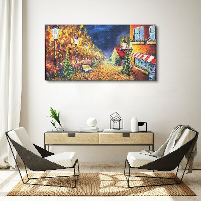 Foto auf leinwand Goldene Allee im Schein der Laternen