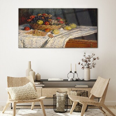 Glasbild Obstkorb auf einer weißen Tischdecke