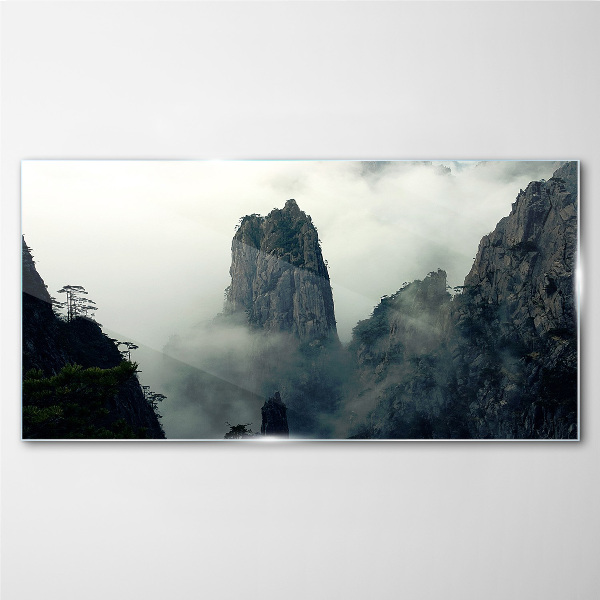 Glasbild Neblige Berglandschaft