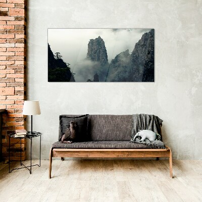 Glasbild Neblige Berglandschaft