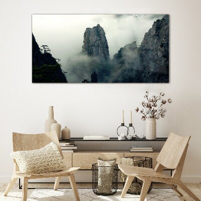 Glasbild Neblige Berglandschaft