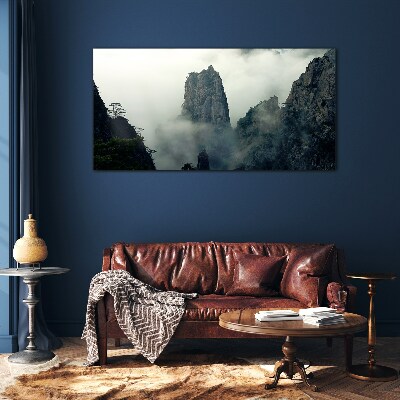 Glasbild Neblige Berglandschaft