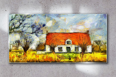 Glasbild Ein farbenfrohes Landhaus in der Landschaft