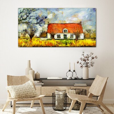 Glasbild Ein farbenfrohes Landhaus in der Landschaft